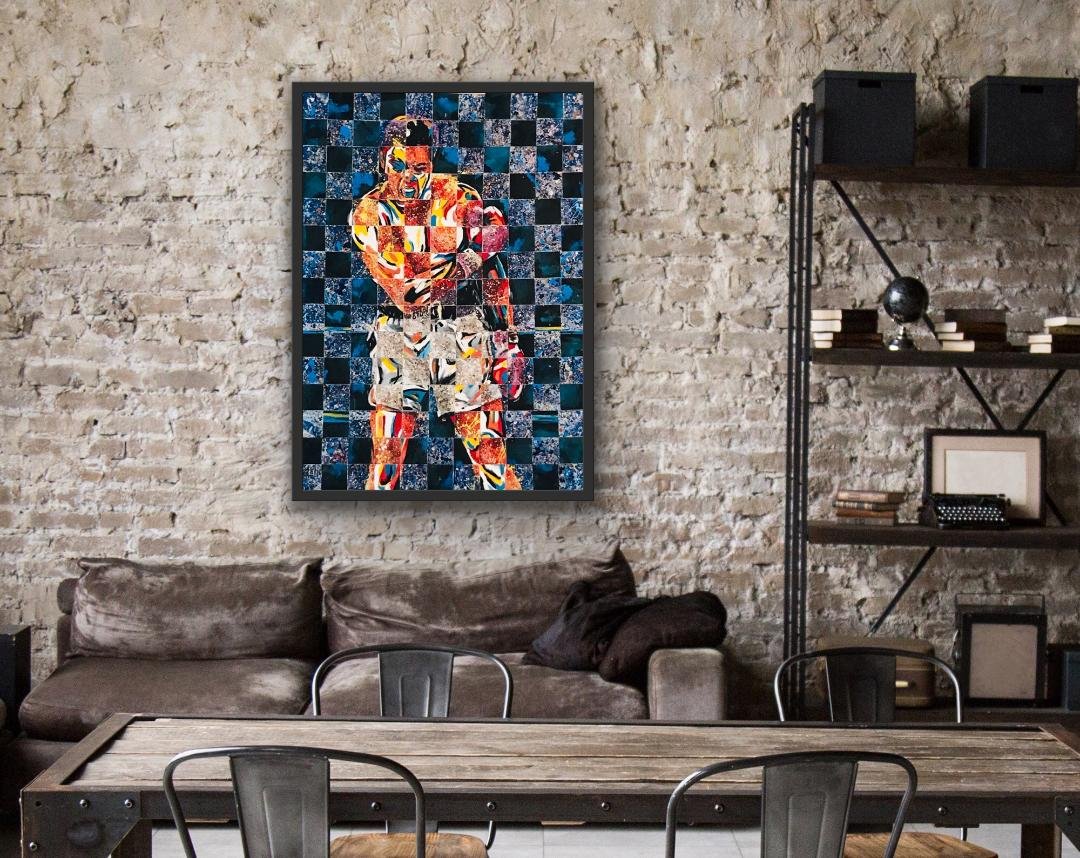 Muhammad Ali photo-mosaic painting hung in a brick loft above a dining table